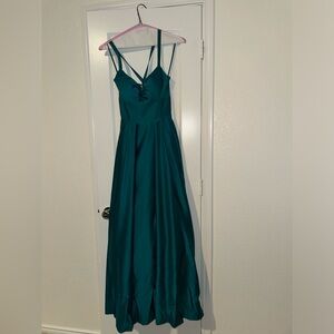 A turquoise bridesmaid dress. Worn only once.
